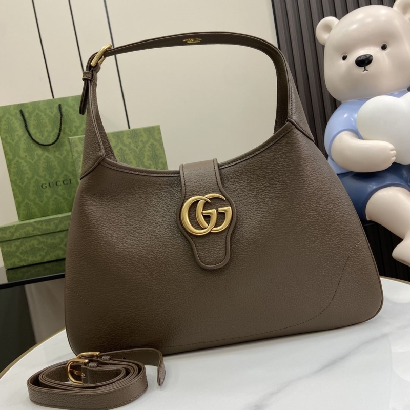 G*u*i top handle bags